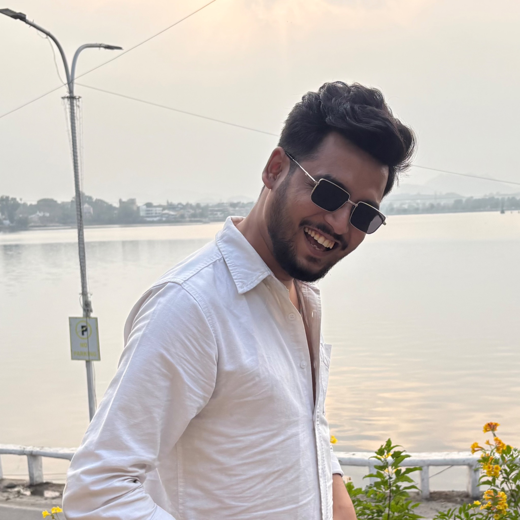 Badal Kalra outdoors by a lakeside